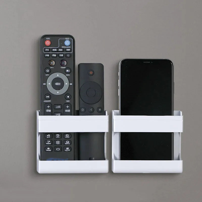 Organizador multifuncional montado en la pared para mandos a distancia y teléfonos móviles